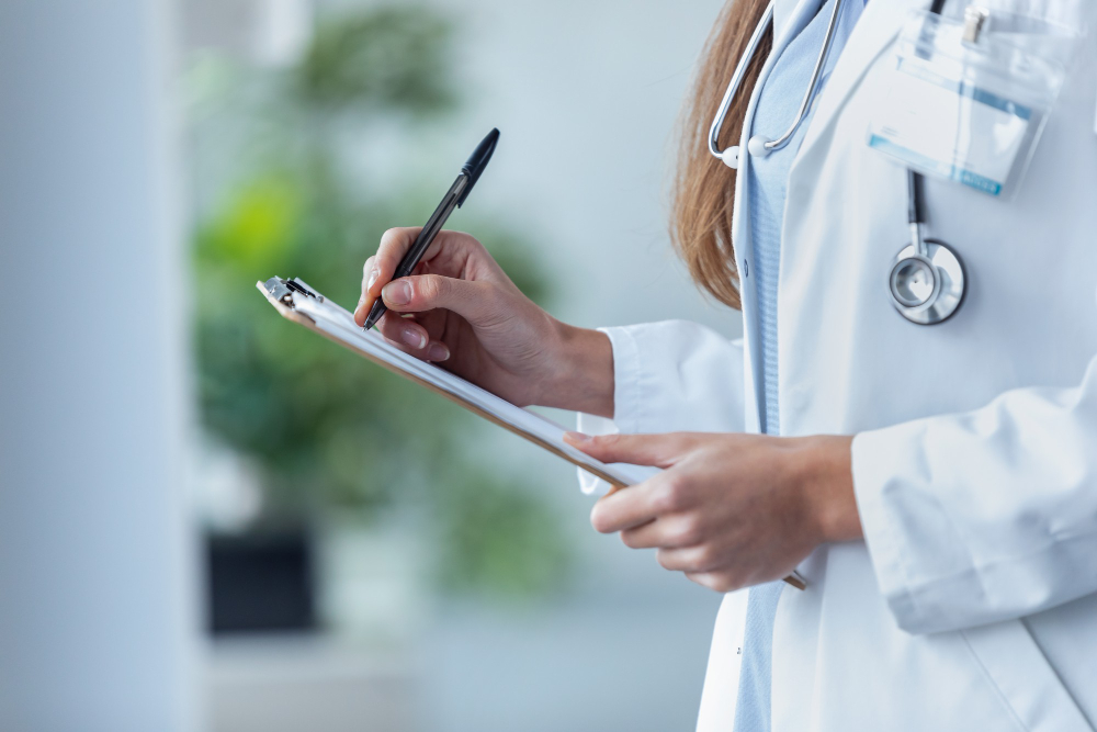 Professional medical consultation with stethoscope and homeopathic treatment