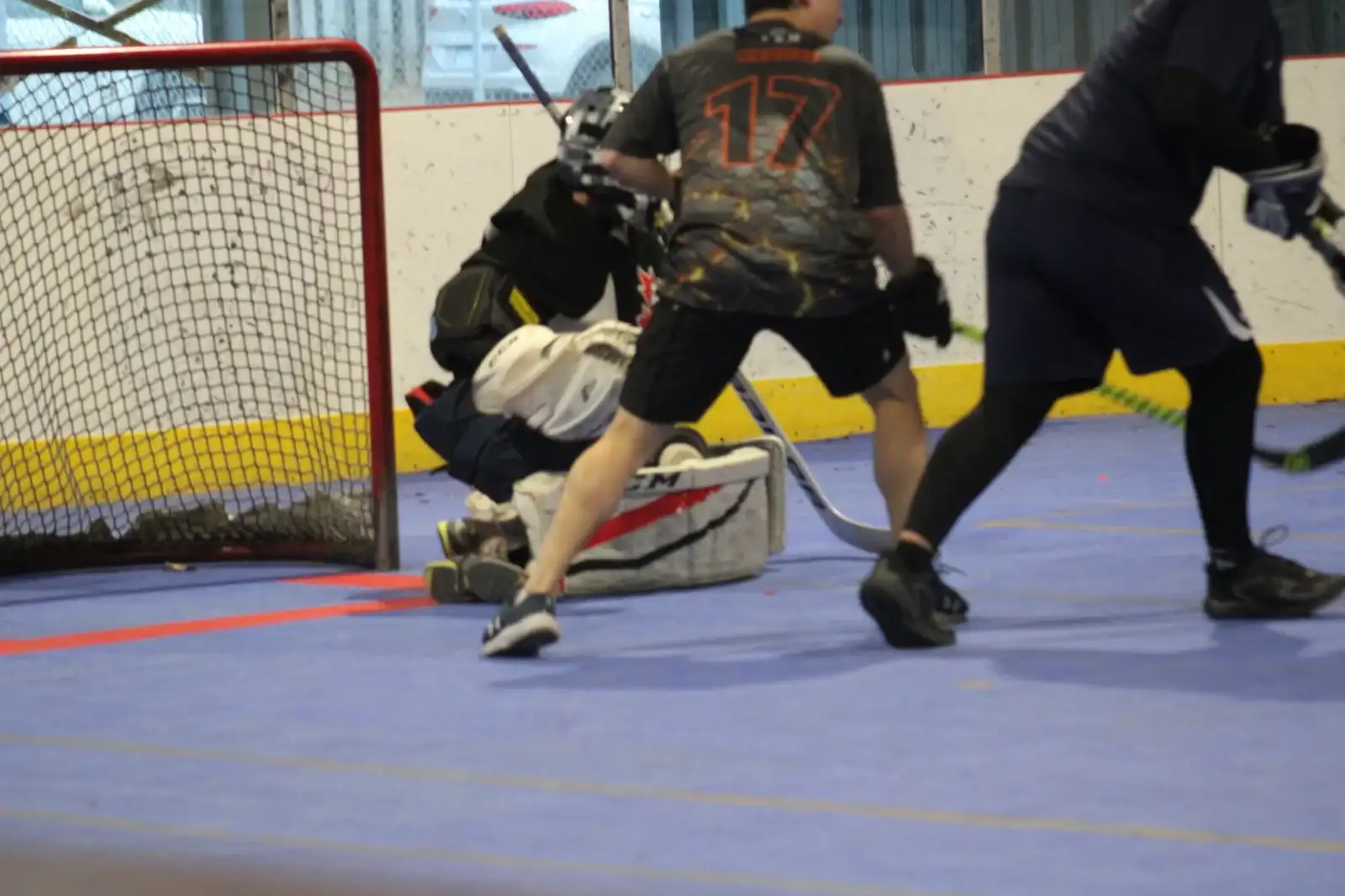 Ball hockey game action