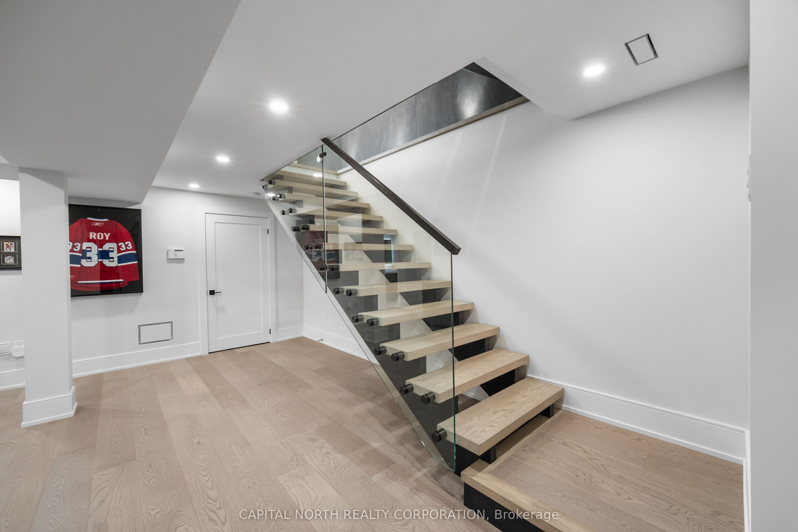 Floating Glass Staircase Basement